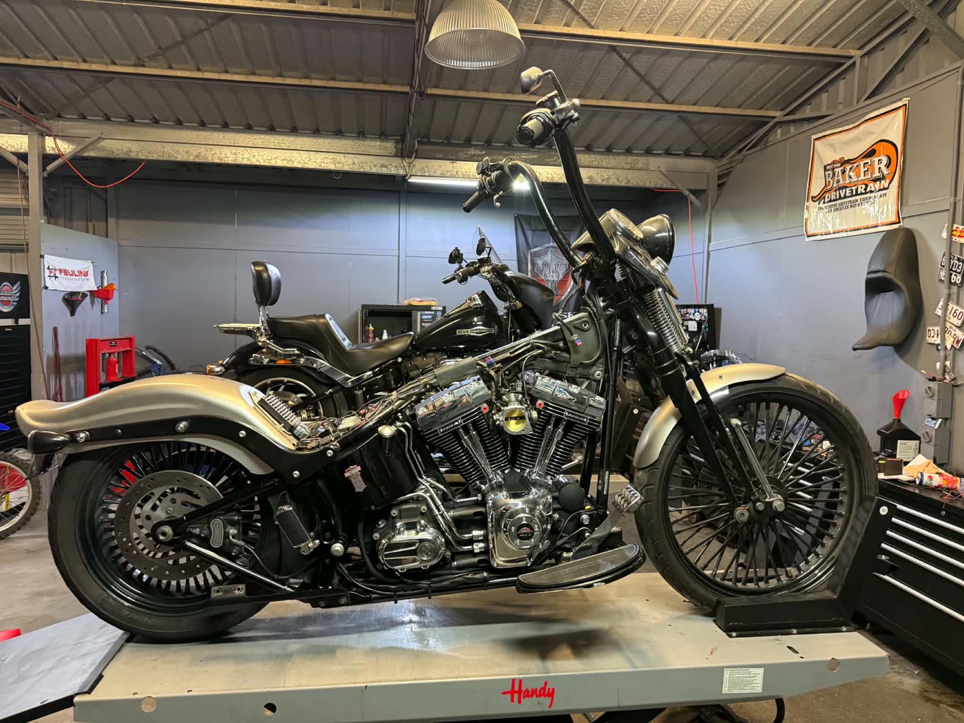 Harley on the hoist in the workshop